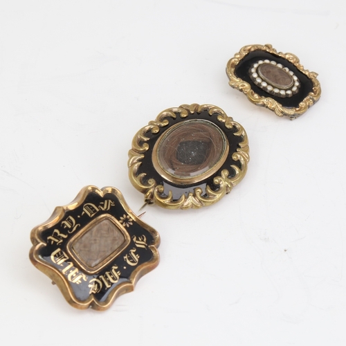 1147 - 3 Victorian black enamel mourning brooches, unmarked yellow metal settings with central hair panels,... 