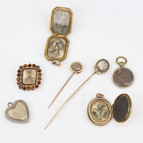 1150 - A group of Antique mourning jewellery, including photo pendant lockets, woven hair stickpins, brooch... 