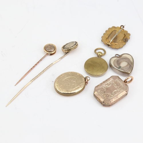 1150 - A group of Antique mourning jewellery, including photo pendant lockets, woven hair stickpins, brooch... 