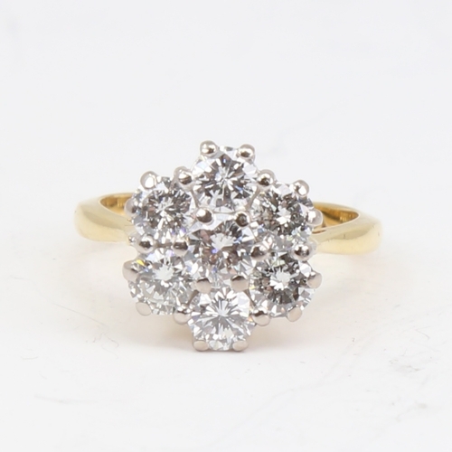 1152 - A late 20th century 18ct gold 7-stone diamond cluster flowerhead ring, set with modern round brillia... 