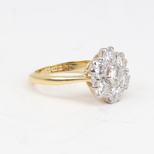 1152 - A late 20th century 18ct gold 7-stone diamond cluster flowerhead ring, set with modern round brillia... 