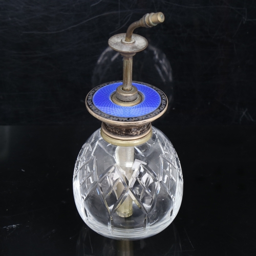 1158 - A George V Art Deco blue enamel and silver-mounted glass dressing table perfume atomiser, by Henry M... 