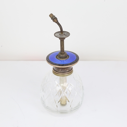 1158 - A George V Art Deco blue enamel and silver-mounted glass dressing table perfume atomiser, by Henry M... 