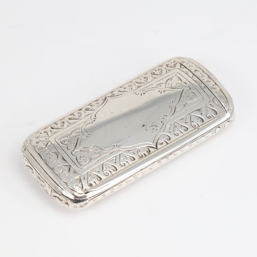 1161 - A Victorian silver snuffbox, rectangular cushion form with bright-cut engraved decoration and gilt i... 