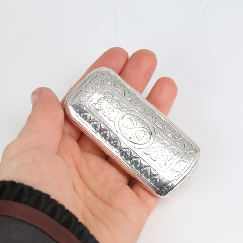 1161 - A Victorian silver snuffbox, rectangular cushion form with bright-cut engraved decoration and gilt i... 