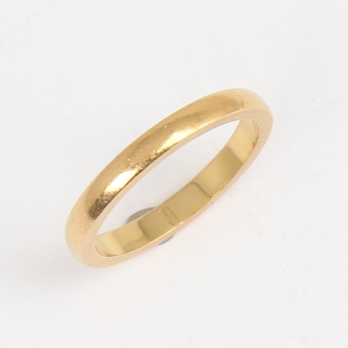 1163 - An early 20th century 22ct gold wedding band ring, makers marks HS, hallmarks Birmingham 1931, band ... 