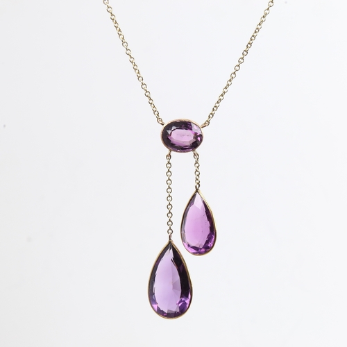 1166 - ***WITHDRAWN*** A 9ct gold amethyst negligee pendant necklace, set with oval mixed-cut amethyst susp... 