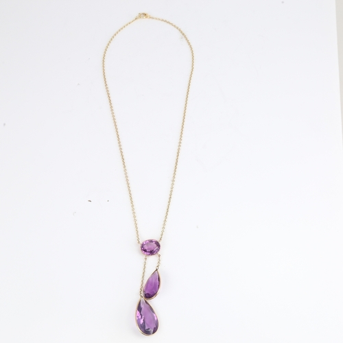 1166 - ***WITHDRAWN*** A 9ct gold amethyst negligee pendant necklace, set with oval mixed-cut amethyst susp... 