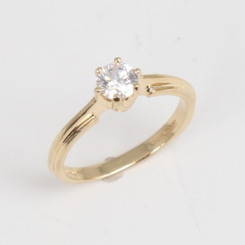 1168 - A modern 14ct gold solitaire cubic zirconia ring, set with modern round brilliant-cut CZ, diameter 4... 