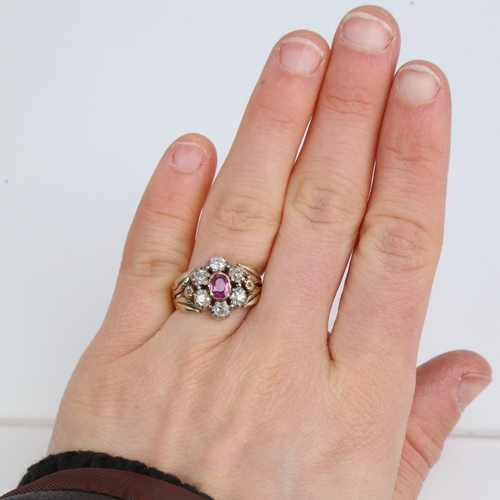 1169 - An Antique unmarked gold ruby and diamond cluster flowerhead ring, set with oval mixed-cut ruby and ... 