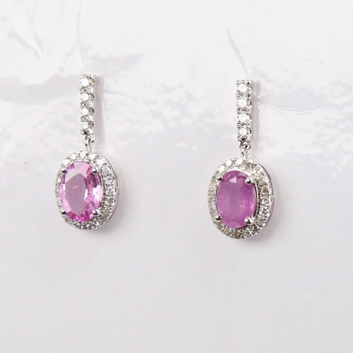 1183 - A modern pair of 14ct white gold pink sapphire and diamond cluster drop earrings, set with oval mixe... 