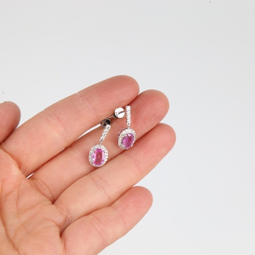 1183 - A modern pair of 14ct white gold pink sapphire and diamond cluster drop earrings, set with oval mixe... 