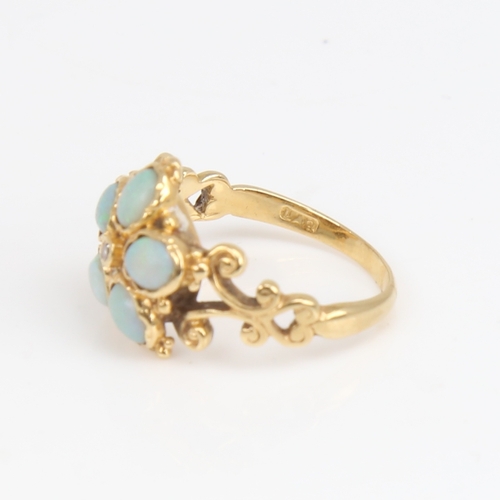 1187 - An 18ct gold cabochon opal and diamond cluster flowerhead ring, pierced and engraved scrollwork shou... 