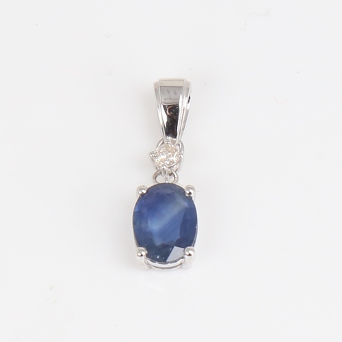 1189 - A modern 14ct white gold sapphire and diamond drop pendant, set with oval mixed-cut sapphire and rou... 