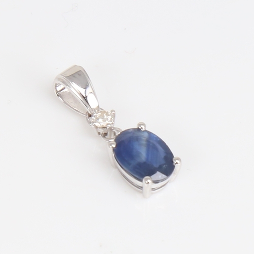 1189 - A modern 14ct white gold sapphire and diamond drop pendant, set with oval mixed-cut sapphire and rou... 