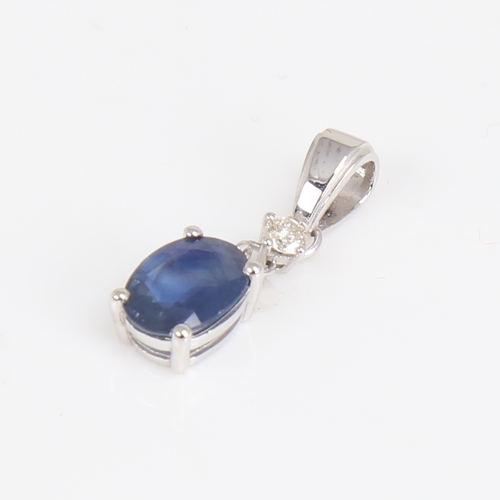 1189 - A modern 14ct white gold sapphire and diamond drop pendant, set with oval mixed-cut sapphire and rou... 