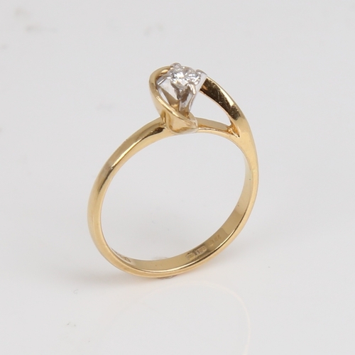 1191 - An 18ct gold 0.15ct solitaire diamond ring, high wrap-around setting with modern round brilliant-cut... 