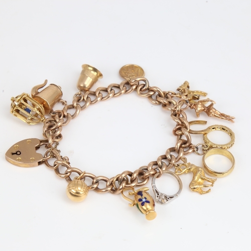 1194 - A 9ct gold curb link heart padlock charm bracelet with 11 9ct charms and 1 18ct charm, bracelet leng... 