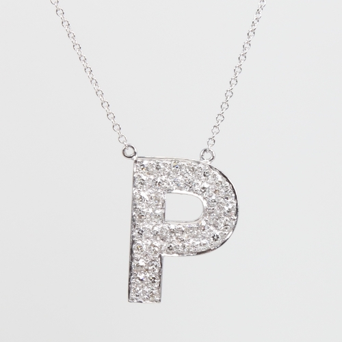 1195 - A modern 9ct white gold diamond initial P pendant necklace, set with old-cut diamonds, total diamond... 