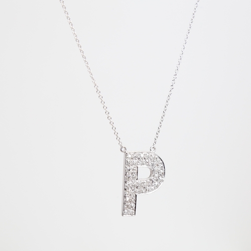 1195 - A modern 9ct white gold diamond initial P pendant necklace, set with old-cut diamonds, total diamond... 