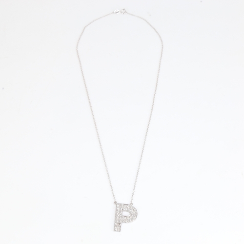 1195 - A modern 9ct white gold diamond initial P pendant necklace, set with old-cut diamonds, total diamond... 