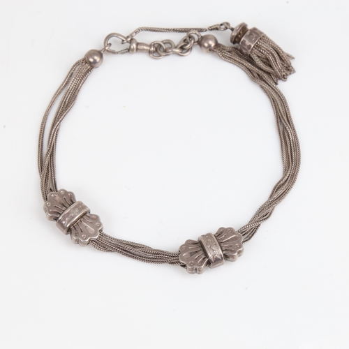 1197 - An Antique French silver Albertina watch chain bracelet, with slides and tassel, overall length 35cm... 