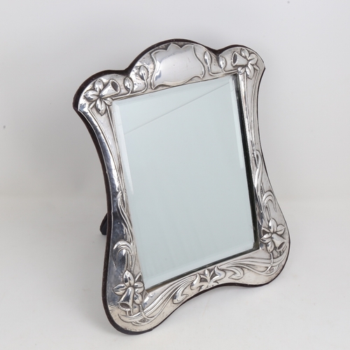 1198 - An Elizabeth II Art Nouveau style silver-fronted dressing table strut mirror, relief embossed daffod... 