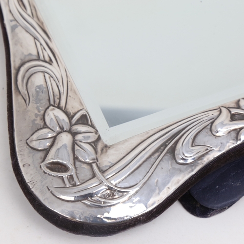 1198 - An Elizabeth II Art Nouveau style silver-fronted dressing table strut mirror, relief embossed daffod... 