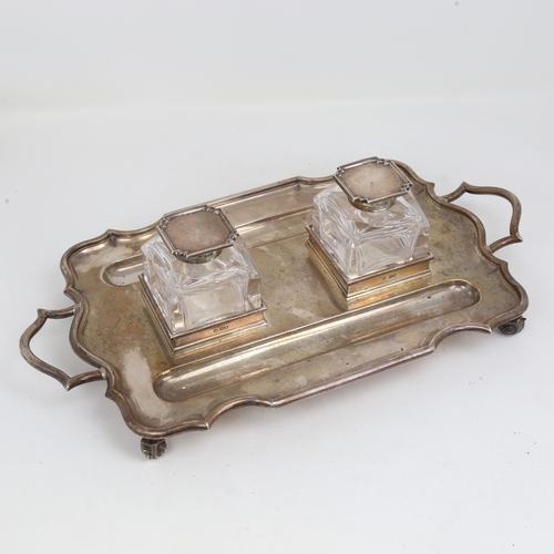 1199 - An Edwardian silver 2-handled deskstand, rectangular form with scalloped rim, 2 pen trays and silver... 