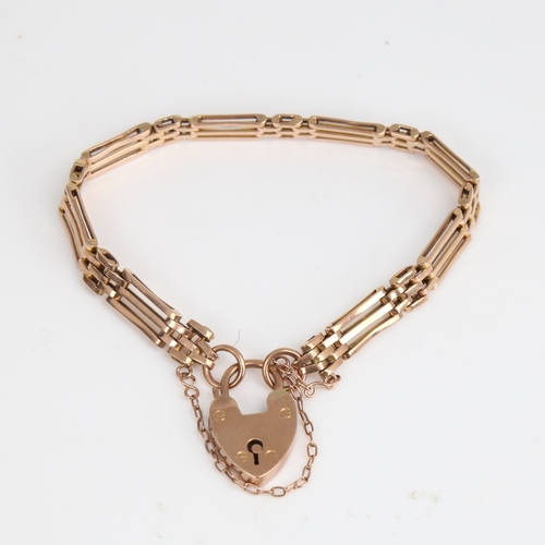 1206 - A Vintage 9ct gold gate link heart padlock bracelet, bracelet length 17cm, 13.3g