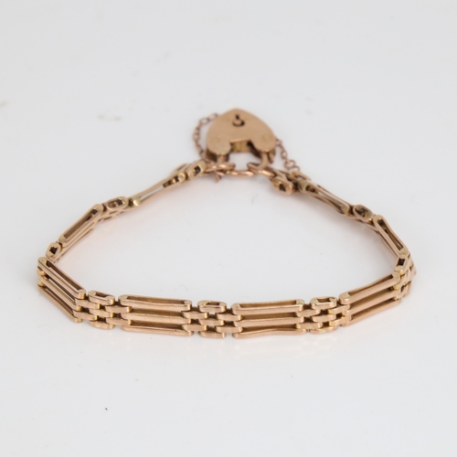 1206 - A Vintage 9ct gold gate link heart padlock bracelet, bracelet length 17cm, 13.3g