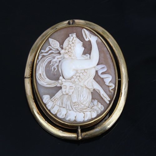 1207 - A Victorian relief carved shell cameo swivel brooch, depicting Bacchante lady with lion pelt and thy... 