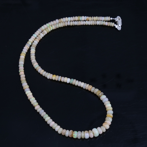 1209 - An Australian fire opal bead necklace, with sterling silver clasp, necklace length 47cm, 12.4g