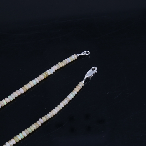 1209 - An Australian fire opal bead necklace, with sterling silver clasp, necklace length 47cm, 12.4g