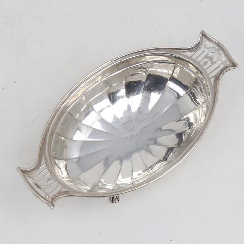 1217 - A George V silver bon bon dish, oval form with pierced handles, by Roberts & Belk Ltd, hallmarks She... 