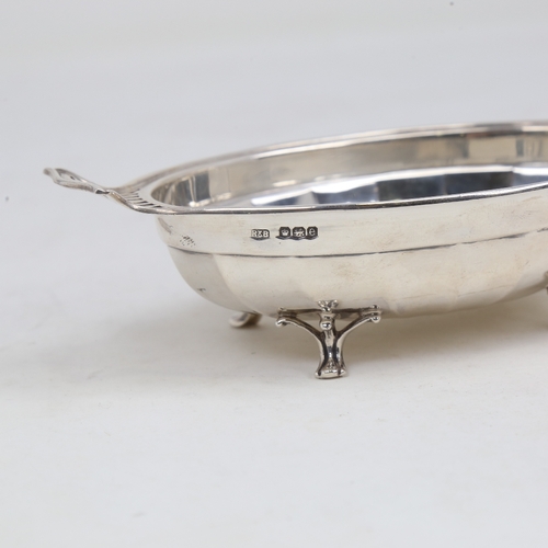 1217 - A George V silver bon bon dish, oval form with pierced handles, by Roberts & Belk Ltd, hallmarks She... 