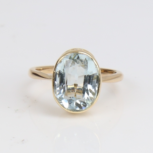 1222 - An 18ct gold aquamarine dress ring, set with oval mixed-cut aqua, setting height 11.8mm, size I, 2.8... 