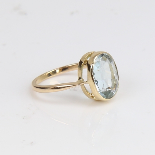 1222 - An 18ct gold aquamarine dress ring, set with oval mixed-cut aqua, setting height 11.8mm, size I, 2.8... 