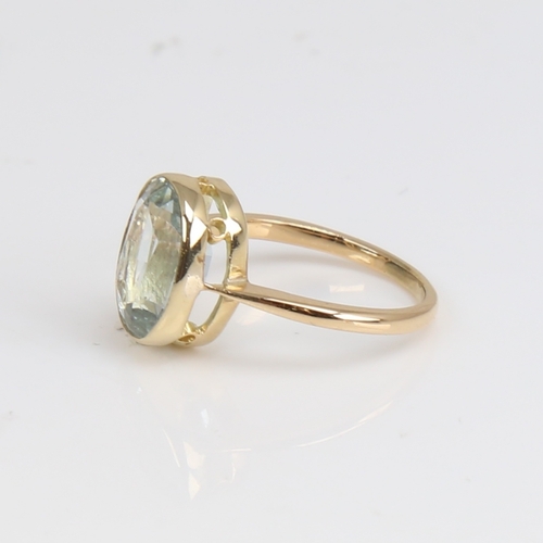 1222 - An 18ct gold aquamarine dress ring, set with oval mixed-cut aqua, setting height 11.8mm, size I, 2.8... 