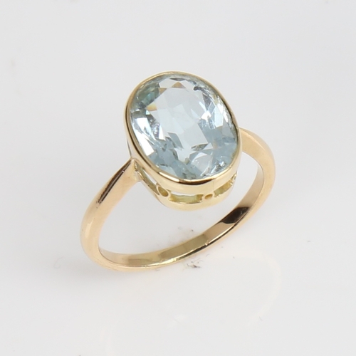 1222 - An 18ct gold aquamarine dress ring, set with oval mixed-cut aqua, setting height 11.8mm, size I, 2.8... 