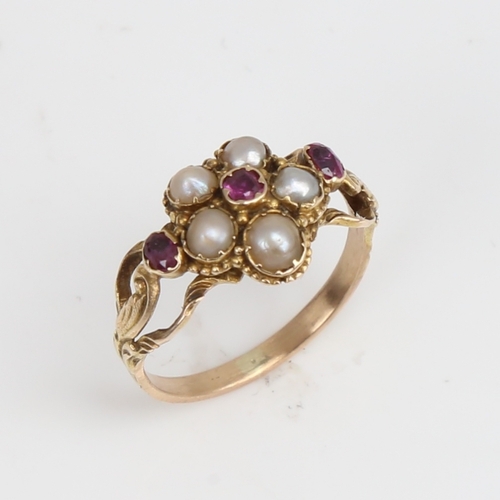 1227 - A Victorian unmarked gold split-pearl and ruby cluster memorial ring, central flowerhead design with... 