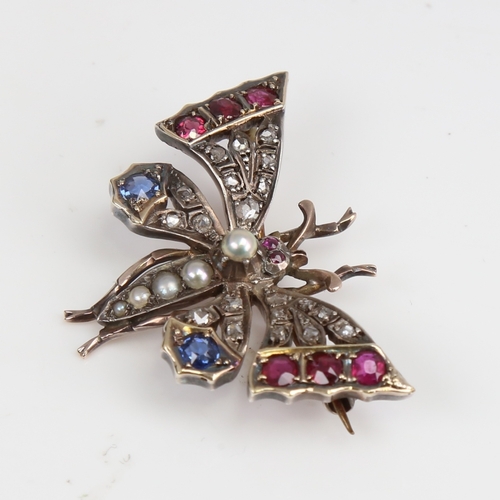 1228 - A Victorian unmarked gold ruby sapphire pearl and diamond figural butterfly brooch, set with round-c... 