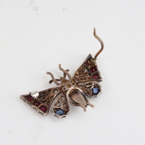 1228 - A Victorian unmarked gold ruby sapphire pearl and diamond figural butterfly brooch, set with round-c... 