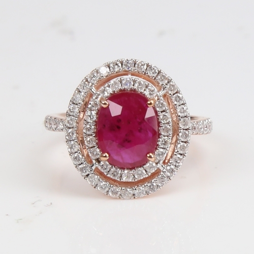 1229 - A modern 14ct rose gold ruby and diamond cluster double-halo ring, set with oval mixed-cut ruby and ... 