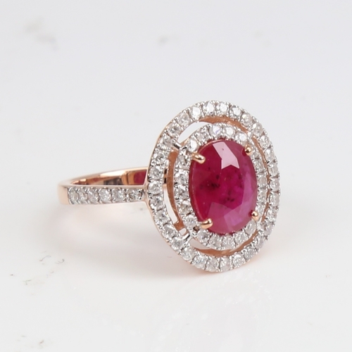 1229 - A modern 14ct rose gold ruby and diamond cluster double-halo ring, set with oval mixed-cut ruby and ... 