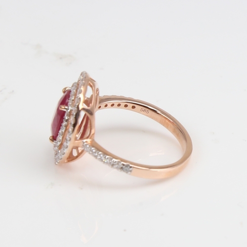 1229 - A modern 14ct rose gold ruby and diamond cluster double-halo ring, set with oval mixed-cut ruby and ... 