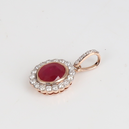 1230 - A modern 14ct rose gold ruby and diamond cluster pendant, set with oval mixed-cut ruby and round bri... 