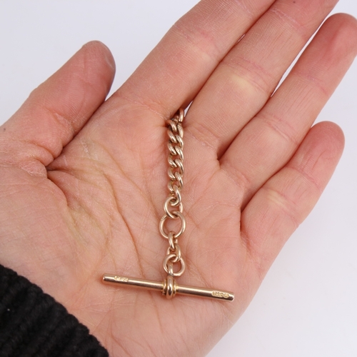 1231 - An early 20th century 9ct rose gold short curb link Albert chain, with dog clip and T-bar, maker's m... 