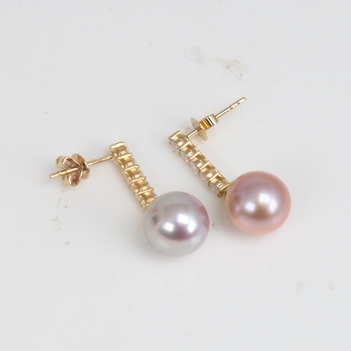 1233 - A modern pair of 14ct gold whole Southsea cultured pearl and diamond drop earrings, set with round b... 