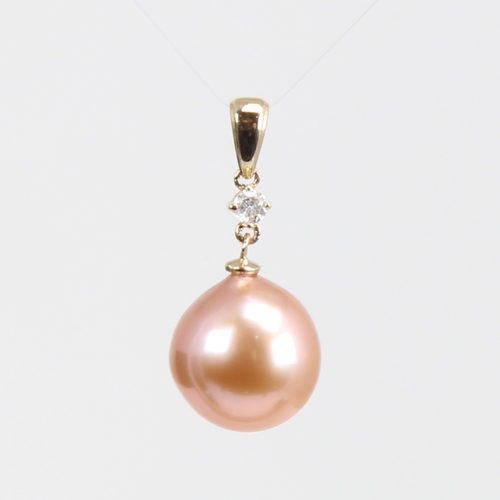 1234 - A modern 14ct gold whole Southsea pearl and diamond drop pendant, set with 0.05ct round brilliant-cu... 